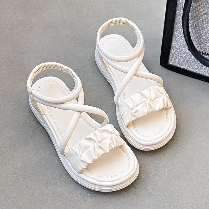 

Французские маленькие сандалии женские летние 2024 года новые мягкие подошвы толстые подошвы универсальные не устают ноги модные стразы пляжные римские туфли 35