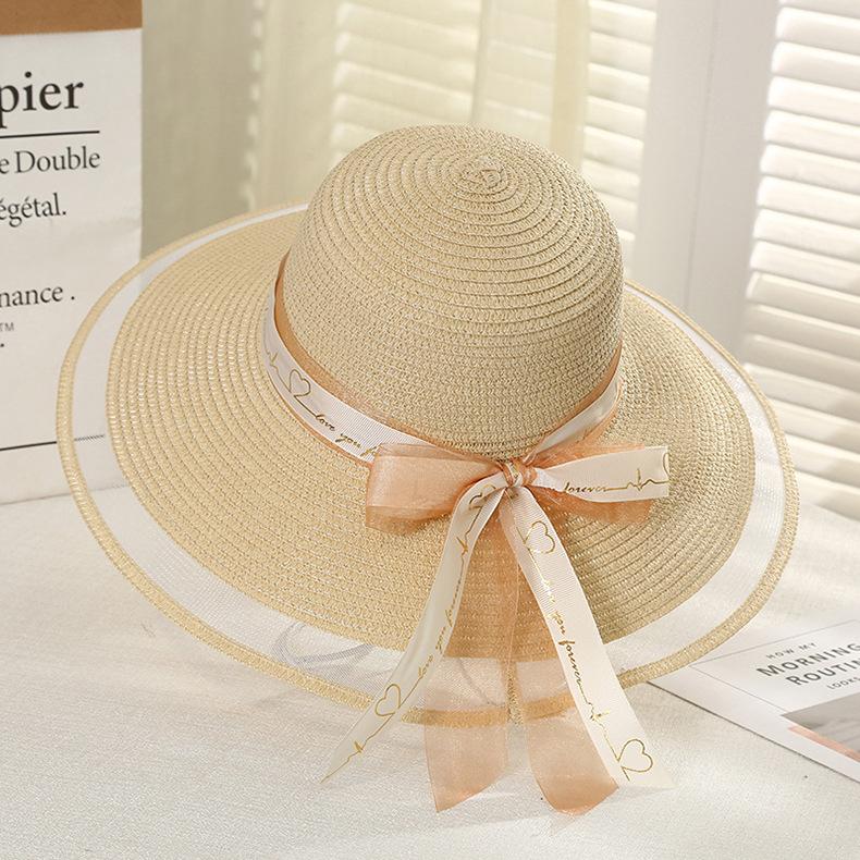 Wide Brim Bucket Hat with Elegant Black Bow - Breathable, Inelastic, and UPF Protective - Perfect for Beach, Travel, and Holiday Outings