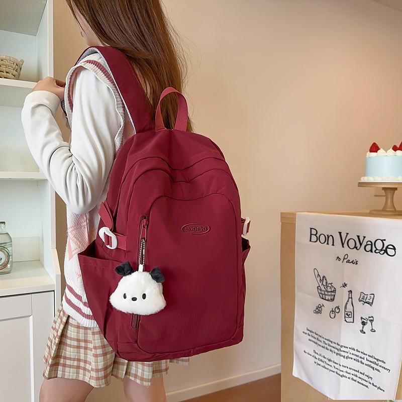 Simple Solid Color Letter Embroidery Student Backpack With Plush Pendant For Middle School Students