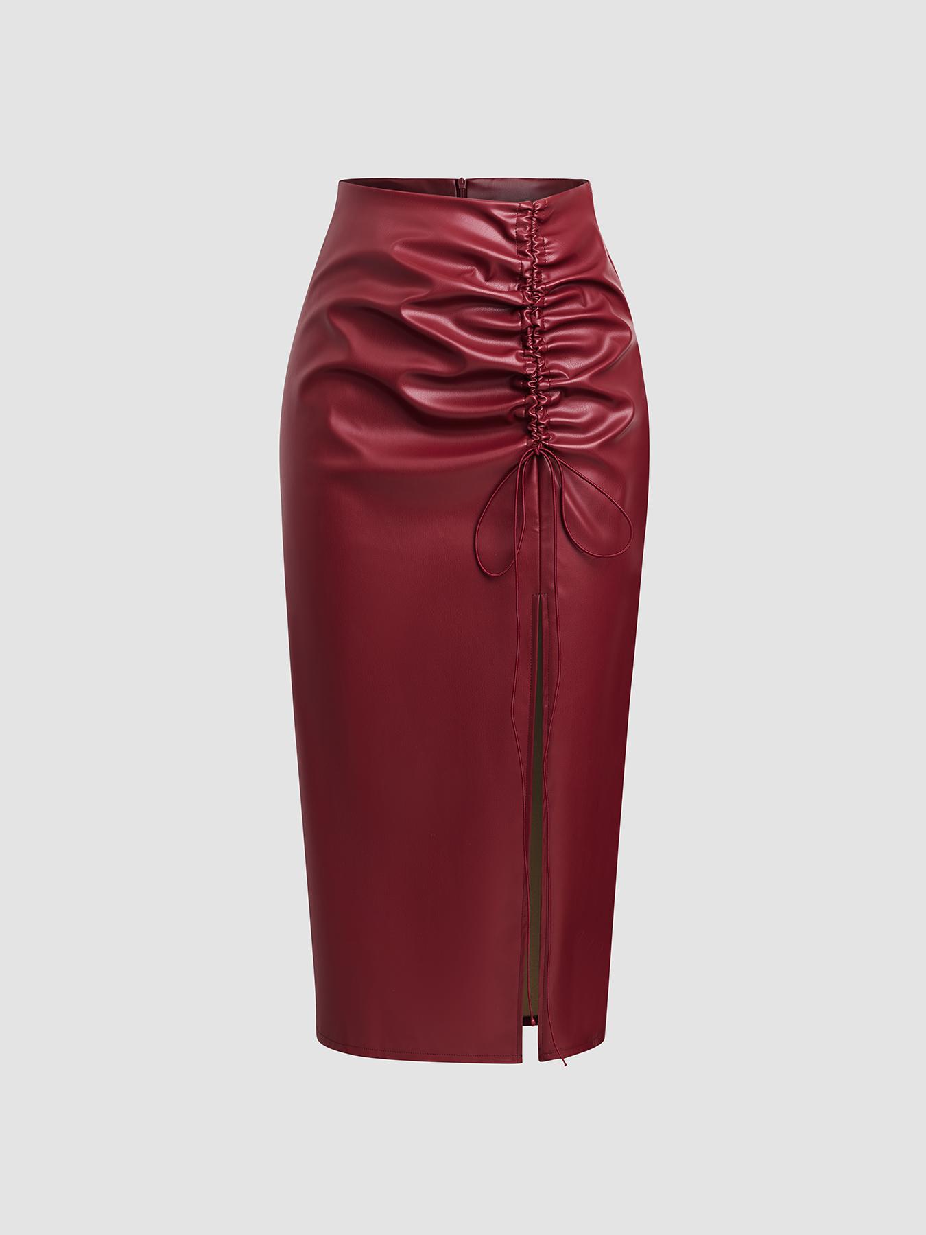 

Однотонна midi-спідниця з еко-шкіри з високою талією, зібрана на куліску, зі шліцом L вина червоного кольору