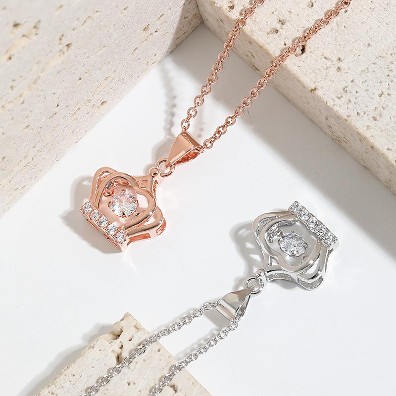 Tanzender Anhänger Schlüsselbeinkette, Japanische und koreanische Version von einfachem Design, schlagendes Herz Krone smarte Halskette