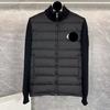 Autumn and winter new stand-up collar knitted splicing light down jacket women's short warm jacket