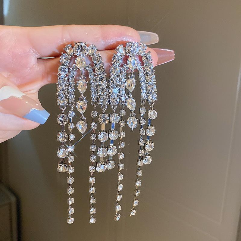Silver Zirconia Bow Tassel Earrings: Korean Style, Exaggerated Luxury Ear Stud Ornaments.