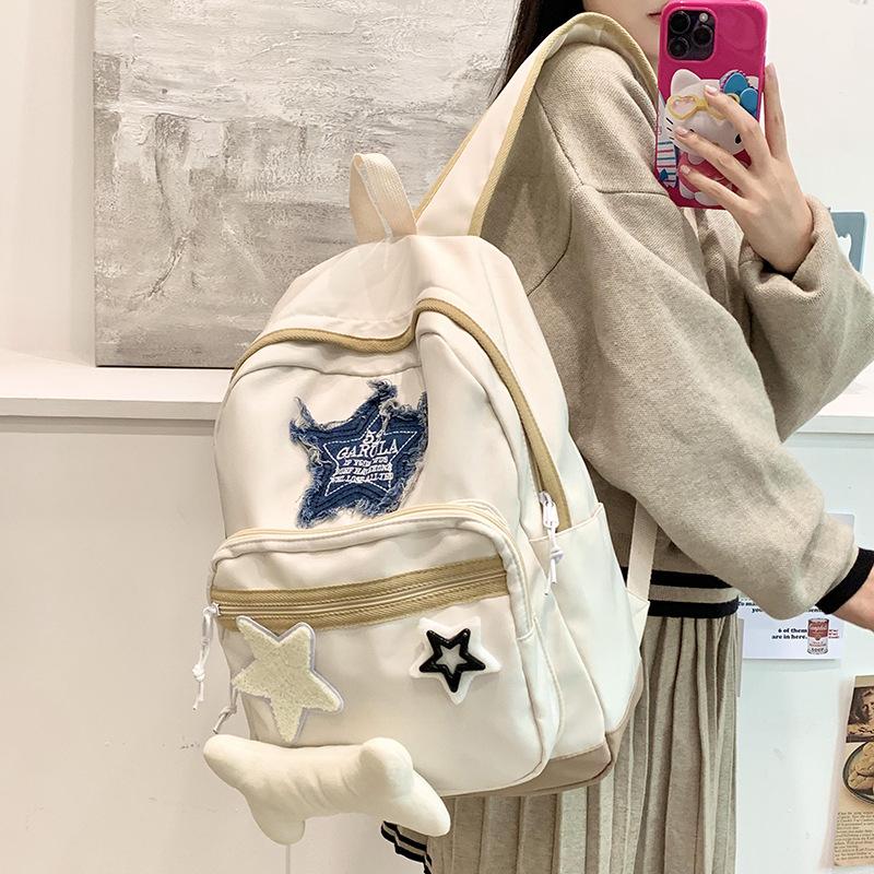 New student schoolbag female trendy cool star backpack large capacity leisure bag travel light backpack