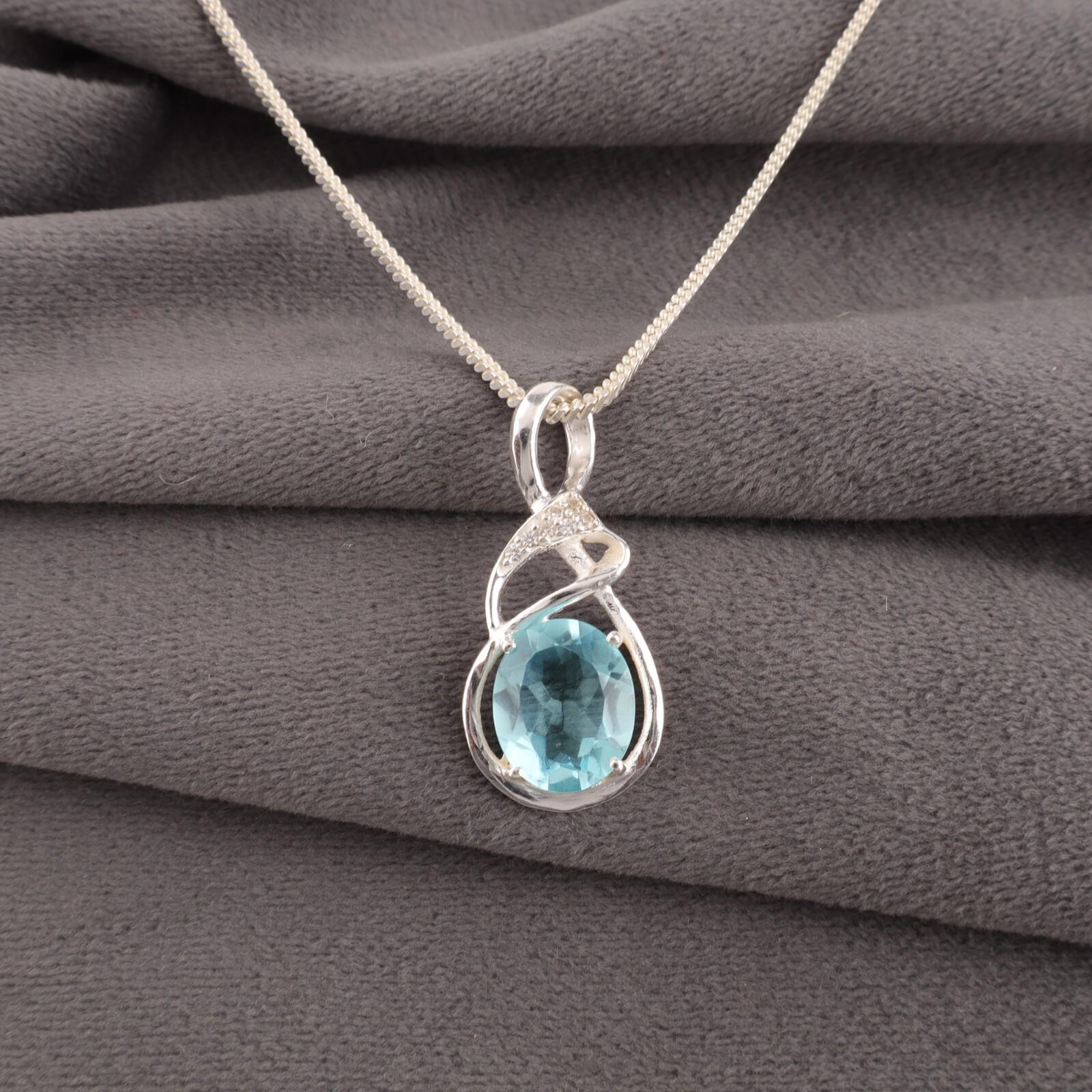 

Oval Sky Blue Topaz Gemstone 925 Sterling Silver Jewelry Zircon Pendant 1.22 CZP-13-9