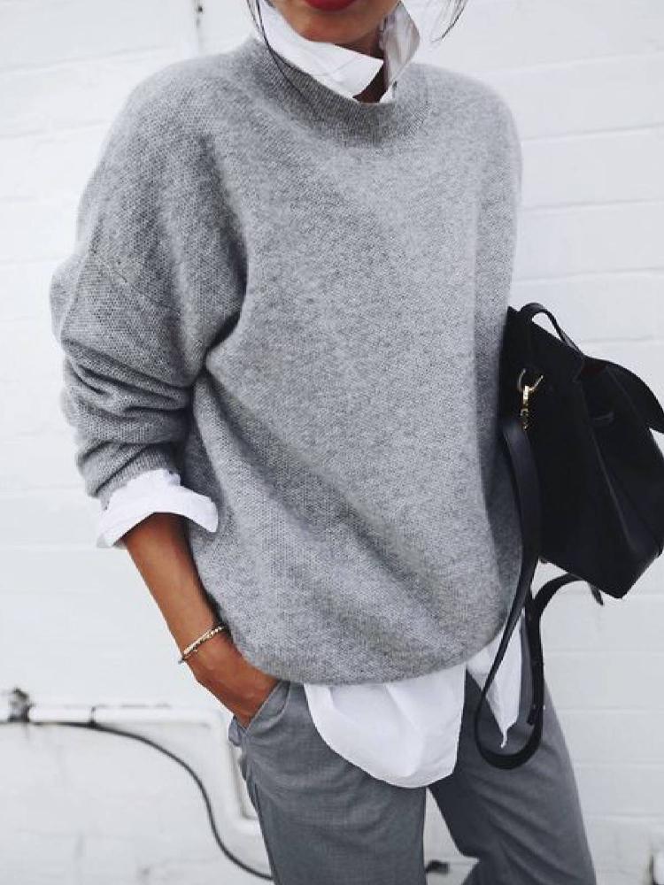A Long-sleeved Sweatshirt with A Collar and A Fake Two-piece Sweater Coat for A Woman