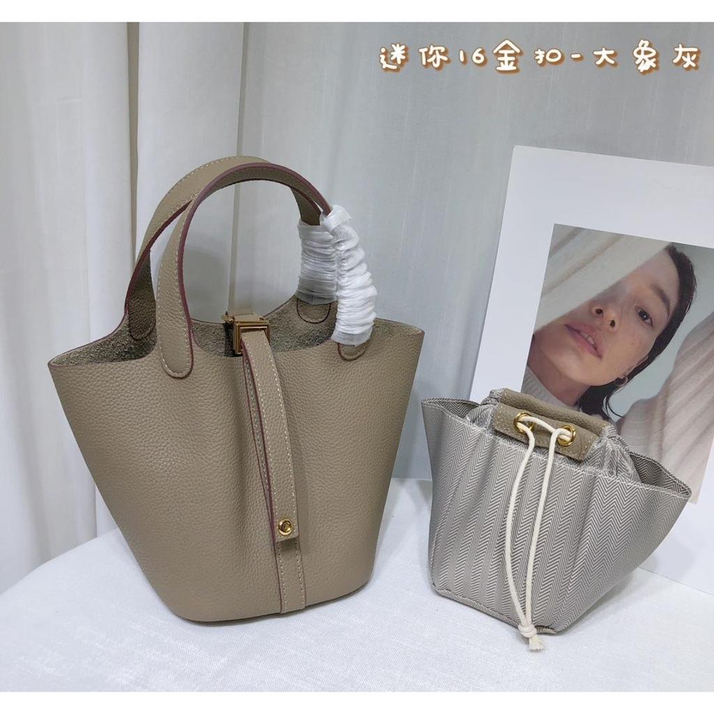 Spot wholesale top layer cowhide vegetable basket bag leather bucket bag commuter fashion lock buckle hand-held handbag woman