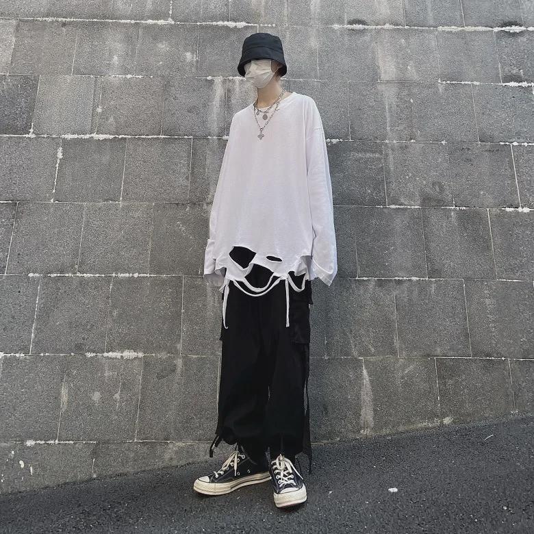 Unisex Loose Fit Long Sleeve T-Shirt with Distressed Hem and Solid Color