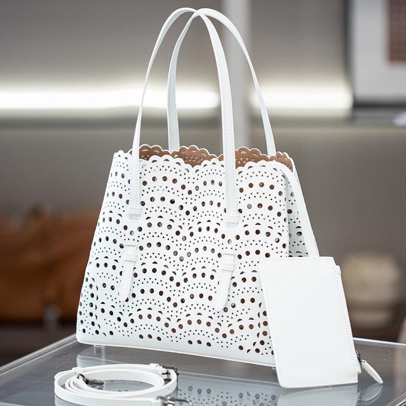 

A Niche Wave Hollowed Out Carved Small Cowhide Vegetable Basket Women s Bag Single Shoulder Crossbody Fashionable Mother And Child Tote Women s Bag 25x12x20cm белый