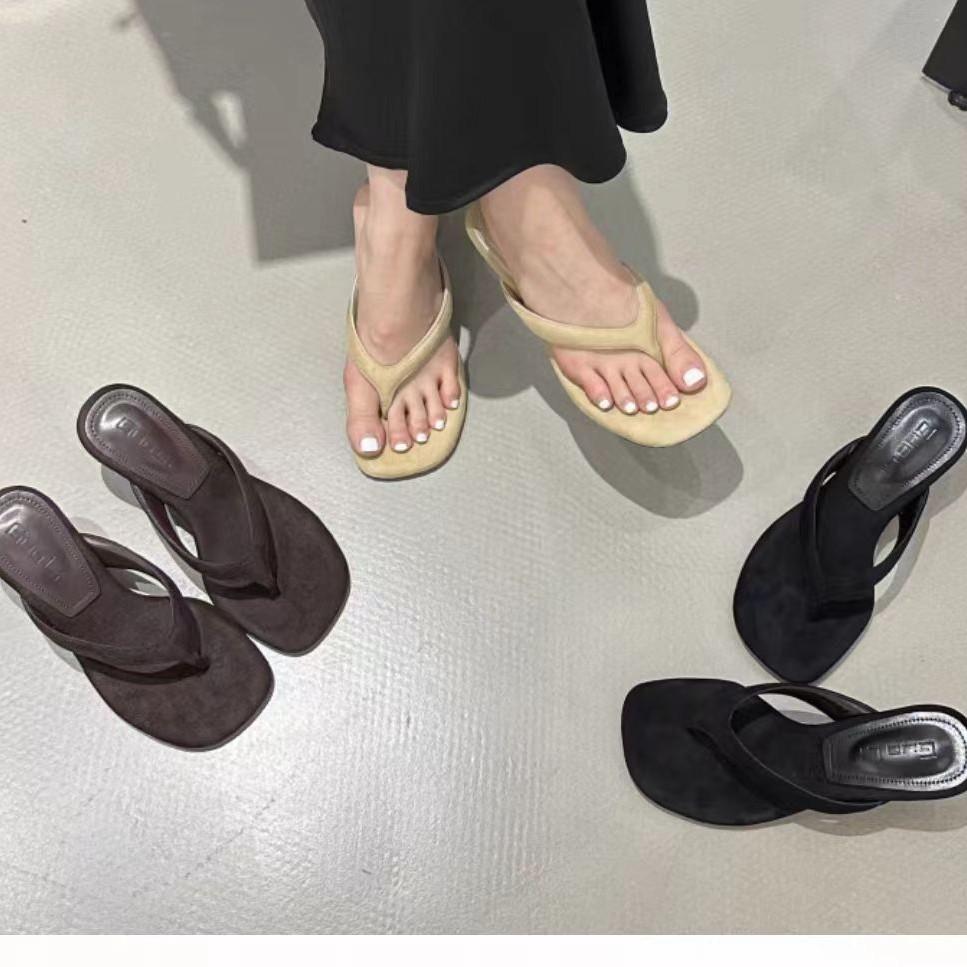 In the Summer of 2025, the New Round-headed Toe Slope High-heeled Leopard Print Lazy Half-drag Wears Open-toed Women's Cool Slippers.