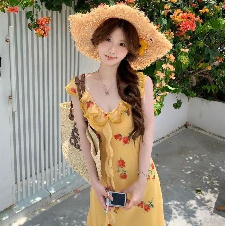 Seaside vacation style temperament waist beautiful long dress women's summer new French coffee break yellow floral dress
