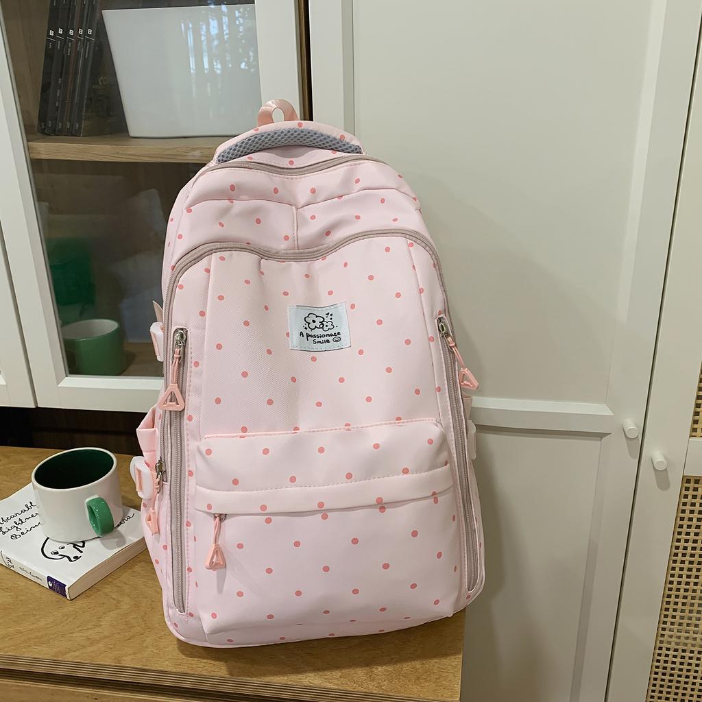 Einfacher Nylon-Rucksack mit Polka-Dots, niedliches Design, lässiger Schülerrucksack mit großem Fassungsvermögen und mehreren Fächern, geeignet für den täglichen Gebrauch und die Schule.