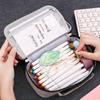 Handheld pencil case, high-end stationery bag for elementary school students, simple and of good quality, portable large capacity stationery box