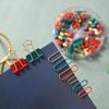 Festive Stationery Set: Christmas Paper Clips, Long Tail Clips, Thumb Tacks in 4-Grid Box - Red, Green & Gold Cultural Binding Gifts