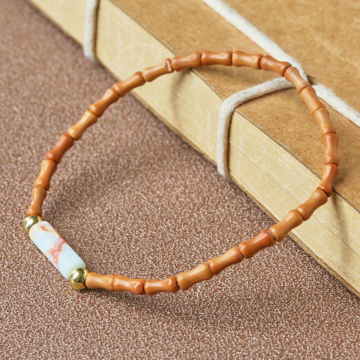 

Элегантный браслет из лимонного жадеита и косточки оливы из шоушаньского камня