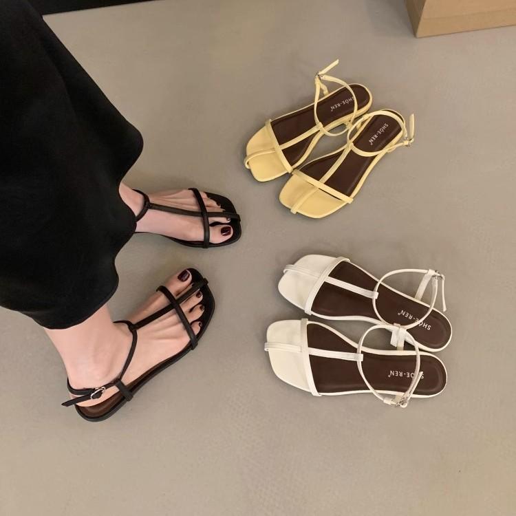 French flat-bottomed thin-strapped sandals women's shoes 2025 new summer Korean version versatile minimalist beach shoes Roman shoes