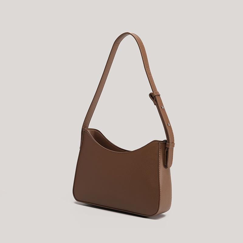 HENGJINGYX einfache Nische 2025 Achselhöhle neue französische tragbare vielseitige Schultertasche Damen-Achseltasche