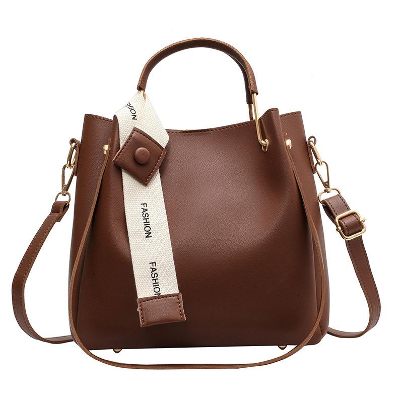 

New large-capacity bag women s autumn and winter new shoulder messenger bag texture women s child and mother portable bucket bag темно-коричневого