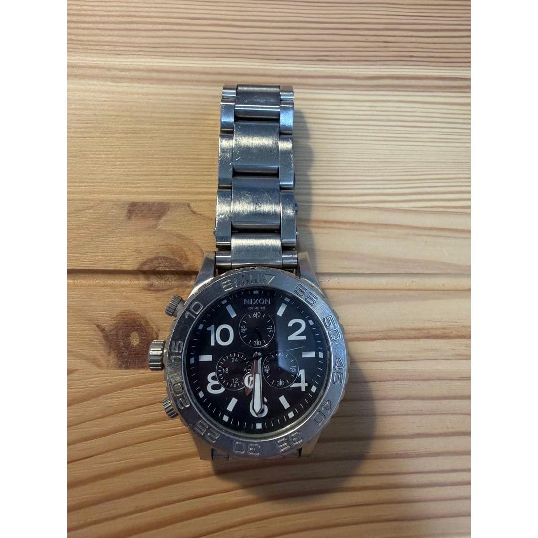 Used Nixon watch Genuine item Super cheap