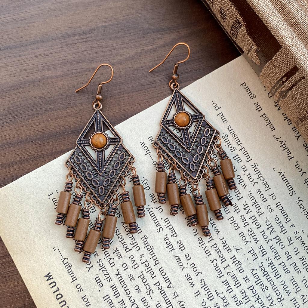 Kolczyki z zawieszką w kształcie muszli w stylu retro etnicznym, modne, z osobowością, niszowe, temperamentne, kolczyki o wykwintnym designie