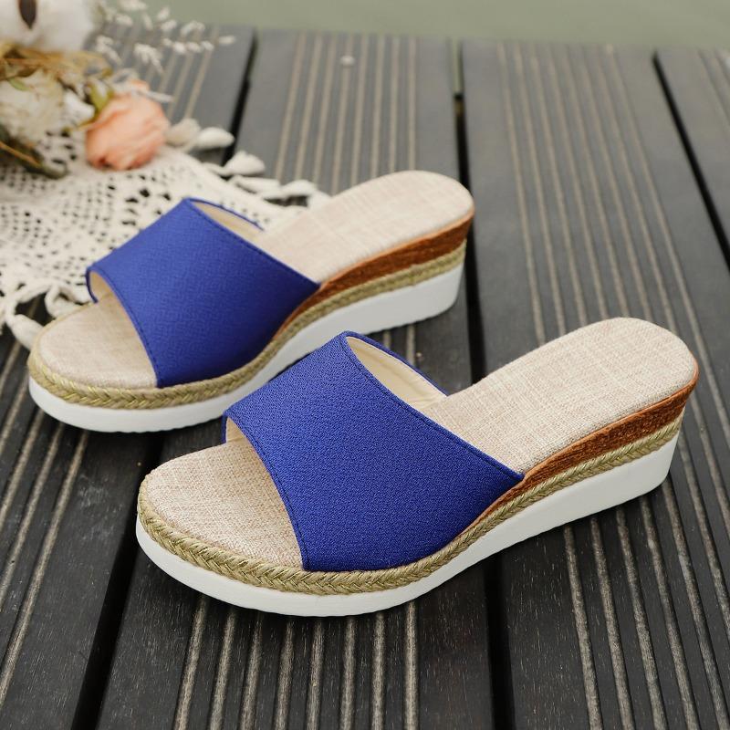 Summer new slope heel slippers women's large size thick bottom medium heel beach fish mouth one-word cool slippers