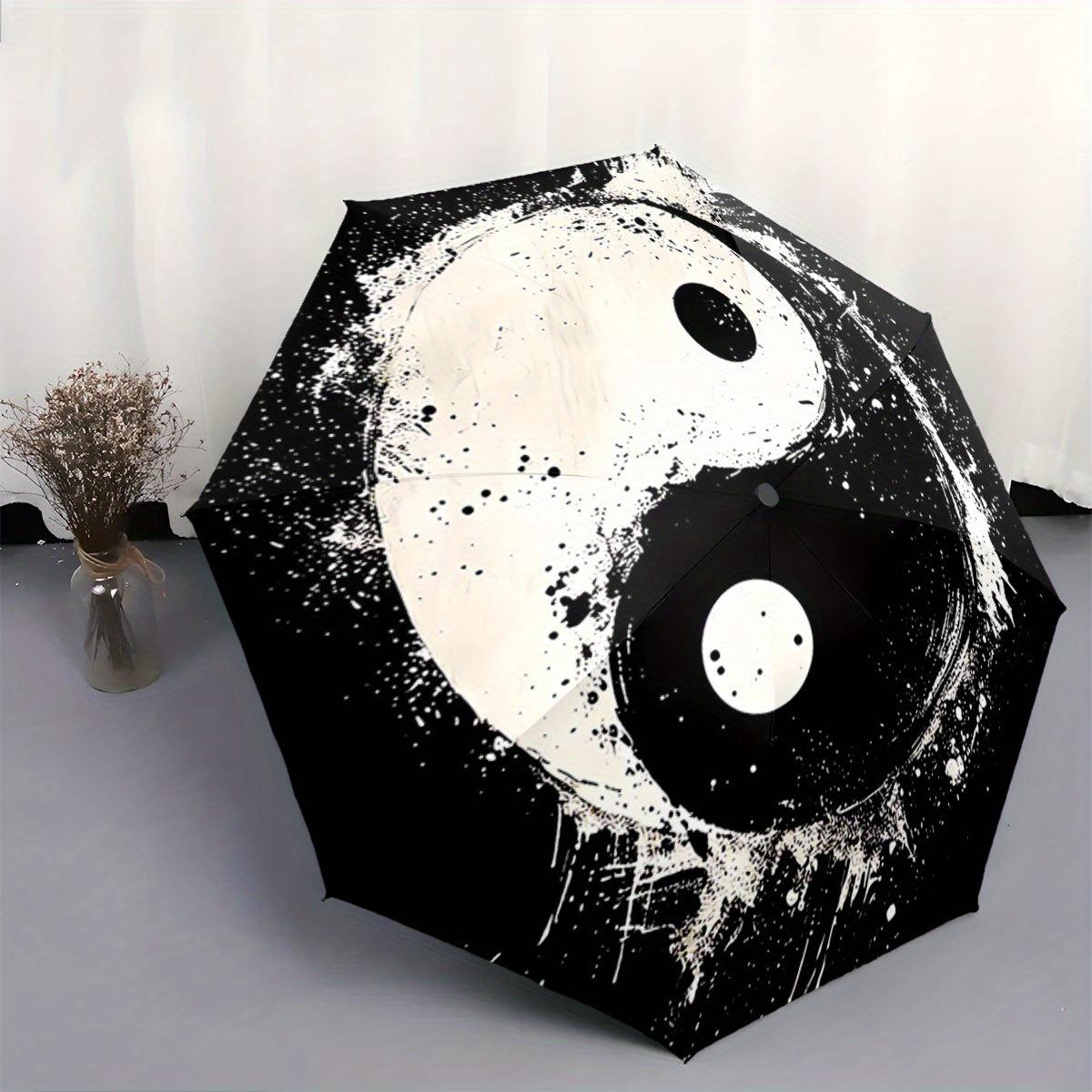 

Automatic Folding Umbrella Yin-yang symbol with paint splatter effect. Portable collapsible design, casual outdoor accessory, Iron&8K