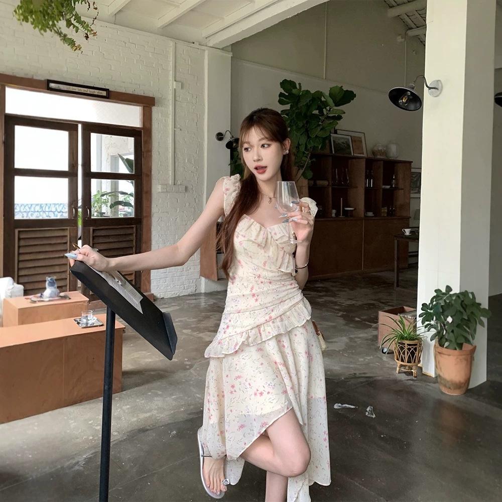 2026 Summer Fresh and Sweet Flying Sleeves Floral Suspender Dress Female Design Sense Vacation Style Fairy Medium and Long Dress Tide