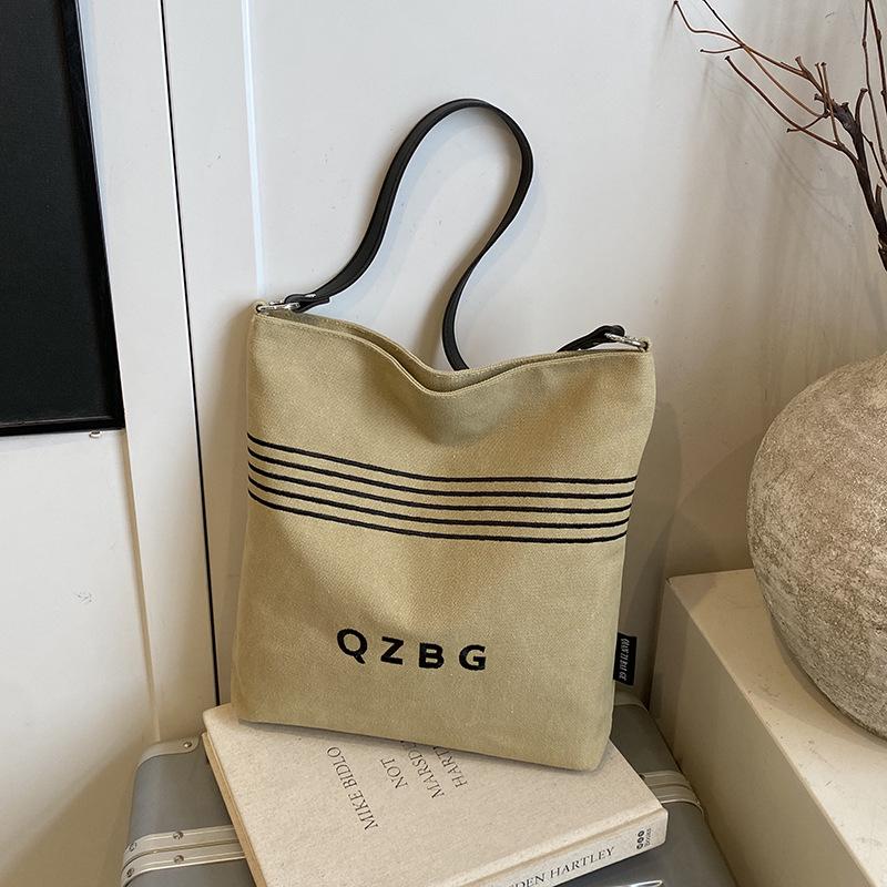 

2025 Women s Casual Canvas Tote: Versatile, Fashionable Commute Shoulder Bag for Students 32cm x 6.5cm x 33cm