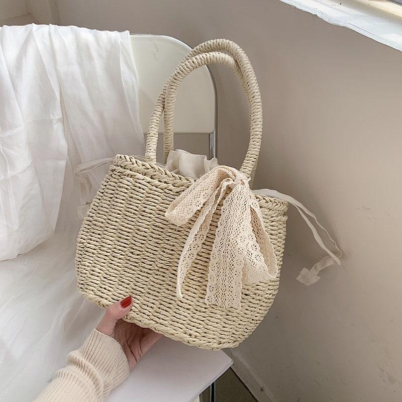 2025 Summer New Straw Bag Women's Seaside Portable Vacation Woven Bag Vegetable Basket Beach Bag Temperament Women's Bag