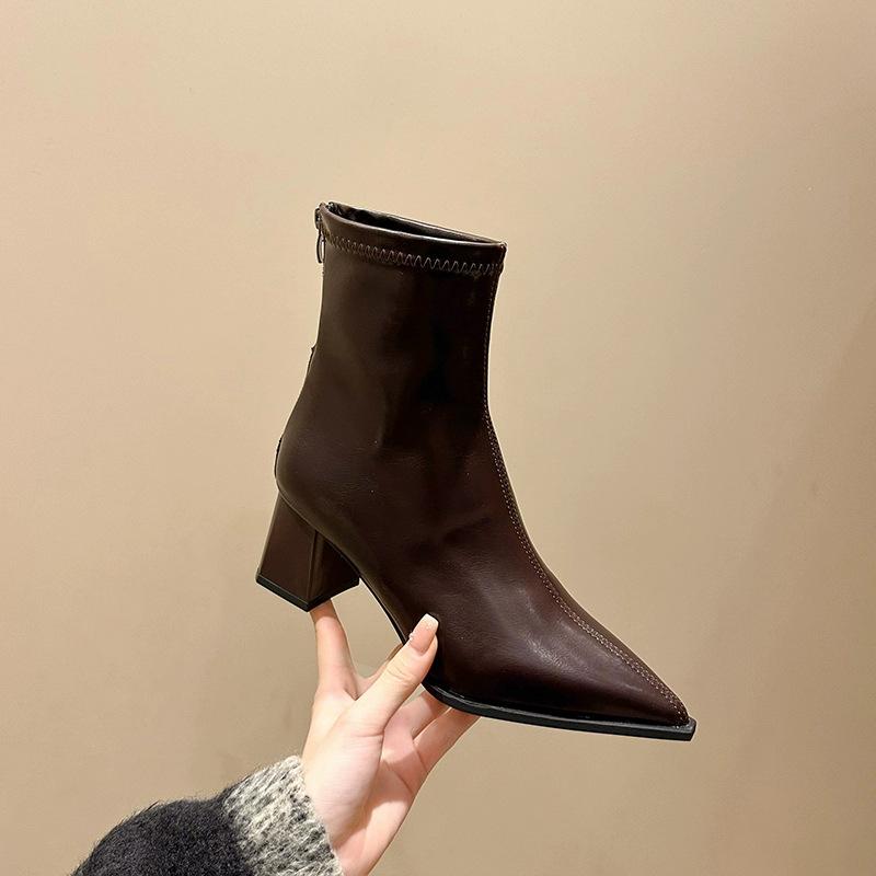 

Niu Niu leather version high-heeled pointed short boots women s 2025 new patent leather high-end thick heel rear zipper Martin boots 43