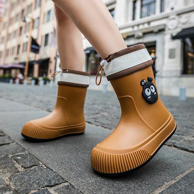 Scarpe da donna – Stivali di gomma e copriscarpe