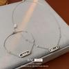 Set Collana e Bracciale Ovali in Zirconia: Eleganti Gioielli dallo Stile Freddo per Donna