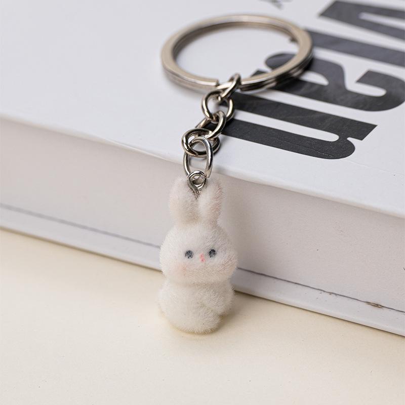 

Adorable 3D Rabbit Resin Flock Keychain Pendant – Car Key Accessory & Bag Charm.