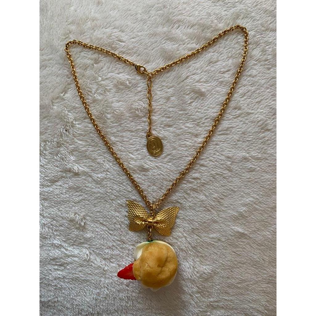 Used Q-pot.Ribbon cream puff necklace