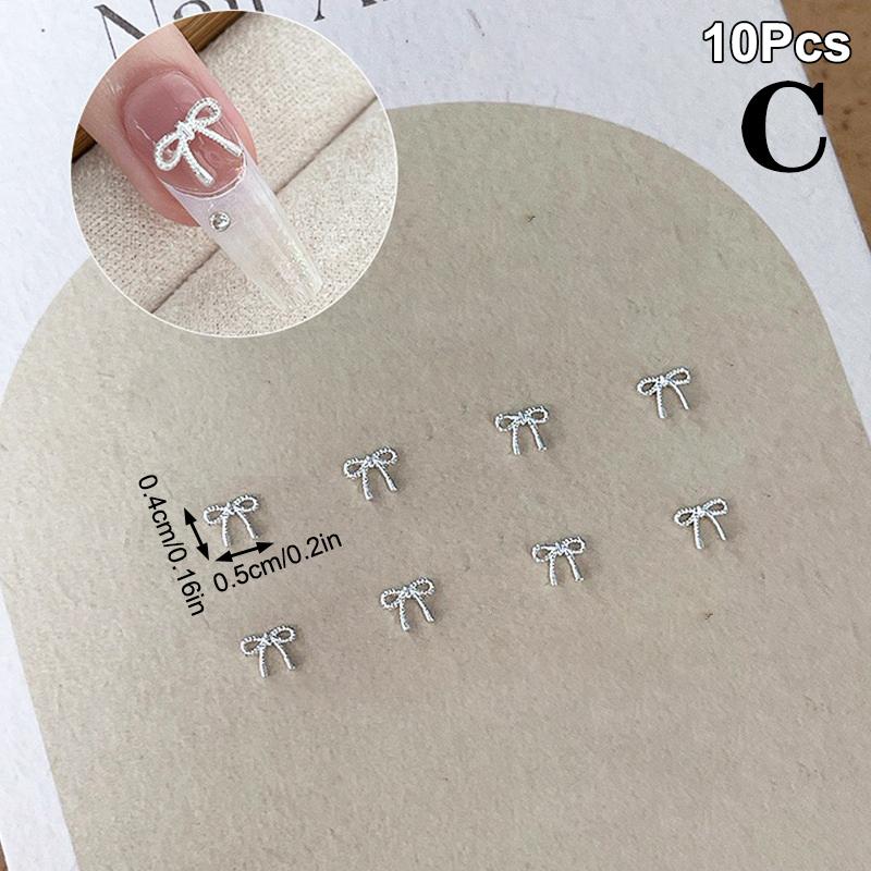 

10 шт. сплава бант любовь ногтей украшения 3D роскошные металлические серебряные банты в форме ювелирных изделий DIY маникюр дизайн принадлежности C
