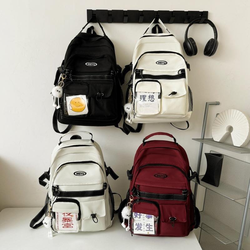 Junior and high school large-capacity class schoolbag female solid color simple leisure travel backpack fashionable canvas versatile backpack