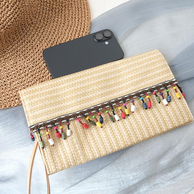 Neue Frühling Sommer Trendy Handtasche Mode Frauen Tasche Solide Stroh Casual Kupplung Frau Niedlich Quaste Vintage Strand Kleine Reise Handtasche