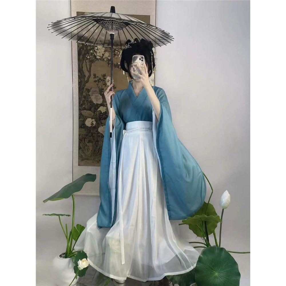 Tre-delat set med korshalsad midjelång kjolstil från Wei- och Jin-dynastierna för kvinnor