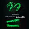 Hand-Tied Luminous Sea Fishing Jig with Double Silicone Ribbons and High Carbon Steel Fish Hooks.