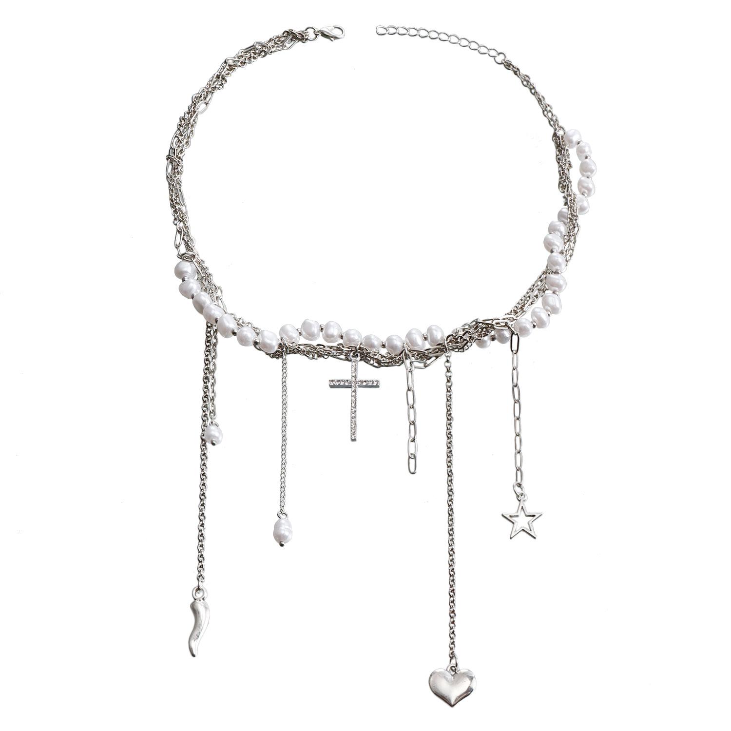 

Elegant Pearl and Star Tassel Necklace: High-End Luxury Design