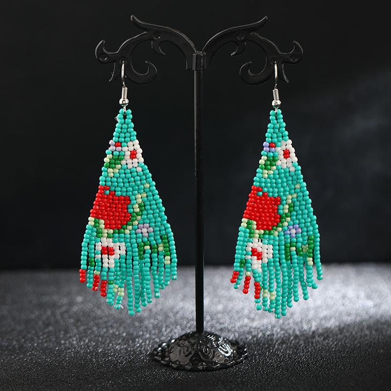 Brincos longos de borla feitos à mão com contas de arroz, nicho retrô boêmio, brincos de férias personalizados e estilosos