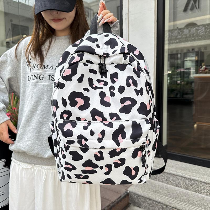 Schoolbag backpack, college student capacity, casual printing three-piece lunch bag, light weight for primary and secondary school students