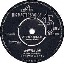 

7inch Record MORECAMBE & WISE - A-wassailing POP1373 His Master s Vo 1964 UK Pop Used