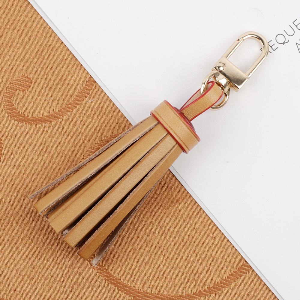 

Tanned Leather Tassel Mini Tassel Bag Charm For Women Handbags Clutch Pouch Purse Key Chain Ring Accessories темно-коричневого