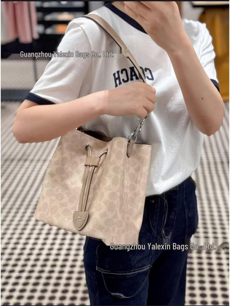 Coach Rowan22 Kabelka typu bucket z pravé kůže - Všestranná retro květinová kabelka do ruky a crossbody