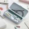 Boîte à fournitures de bureau portable, fine et de grande capacité, couleur macaron, avec compartiments de rangement et coque antichoc. Organisateur de stylos de bureau.