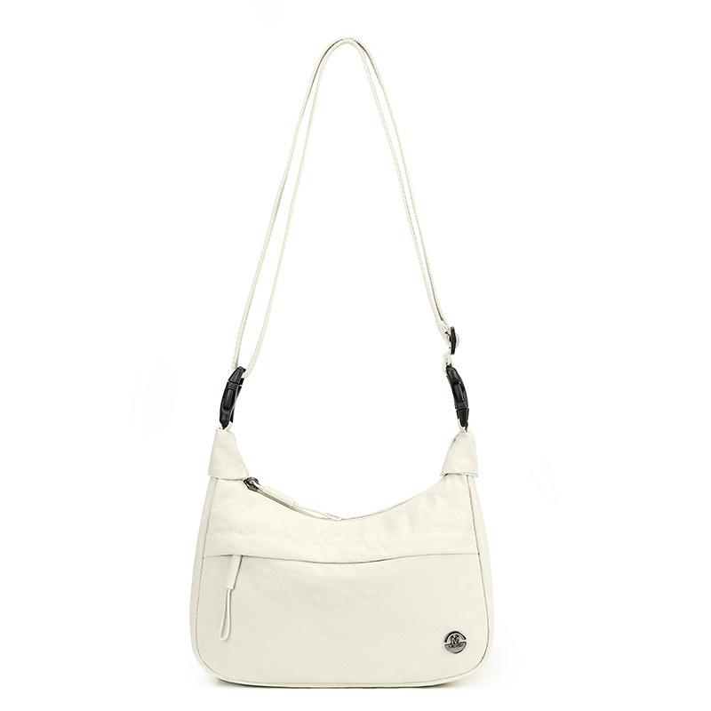 Trend of Light and Simple Messenger Bag Multifunctional Joker Nylon Portable Jiaozi Bag Fashion Commuter Niche Shoulder Bag.