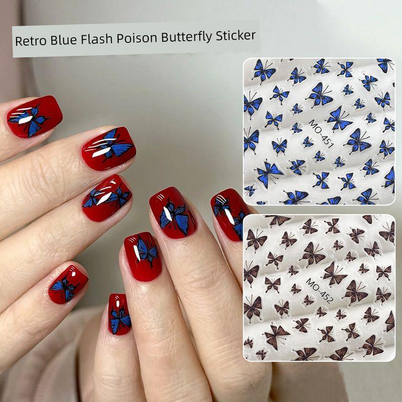 

Black and White Blue Butterfly Nail Stickers Paper Net Red Dream Pure Desire Fenglan Flash Poison Butterfly Nail Relief Sticker Decoration [Four-Color Butterfly] a full set of three