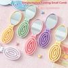 Portable Folding Hair Comb With Mirror, Lightweight & Travel-Friendly For On-The-Go Styling. A Perfect Gift For Women & Girls.