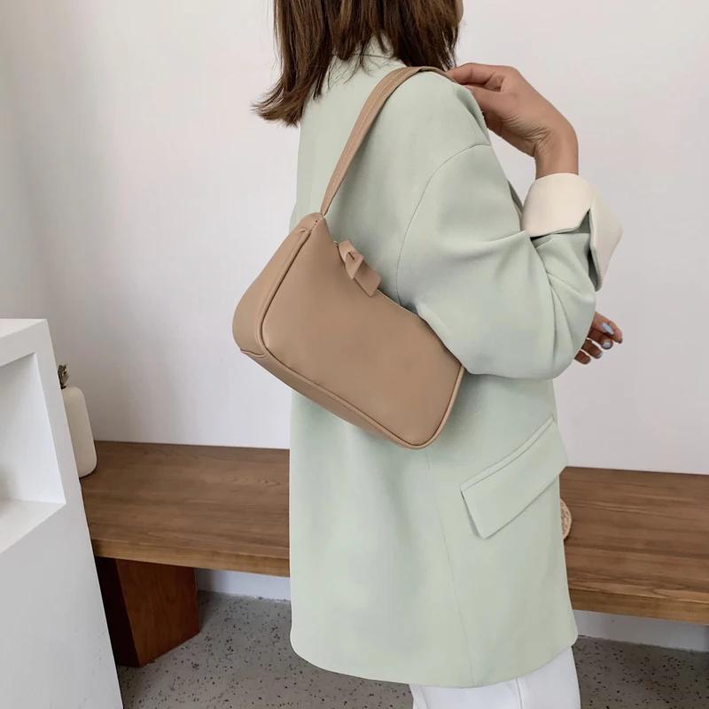 Weiche PU Leder Frauen Lila Unterarm Tasche Retro Einfarbig Damen Handtaschen Mode-Design Mädchen Kleine Schulter Taschen